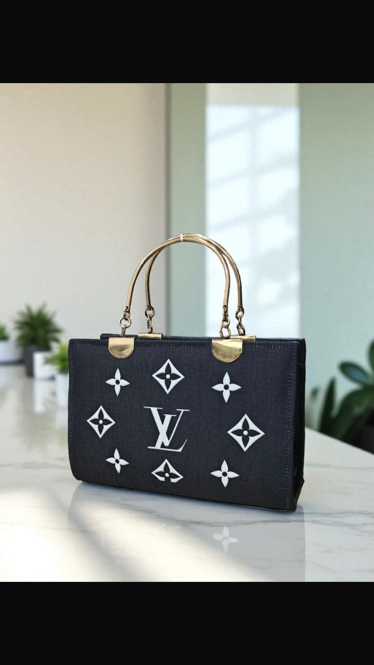 LV Metallic Handle.